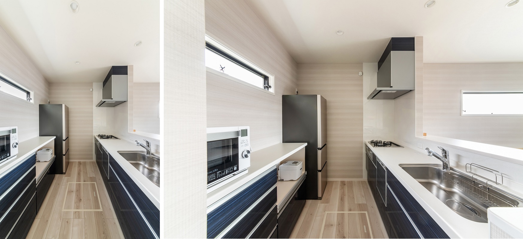 シンプルで機能的な対面式キッチンは、白の天板にネイビーのお色味がスタイリッシュでスマートな仕上がりに。収納棚も腰までの高さに統一している為、スッキリとした空間になっています。